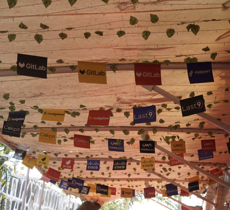 Partner flags strung in rows along the walkway canopy